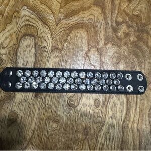 Gorgeous black leather adjustable cuff bracelet covered in rhinestones